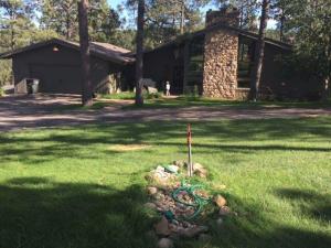 5707 Pioneer Circle – Jon & Tara Schaack Hydrant is 50 feet from front door. Curb stop under small rocks 3 feet north of hydrant, closest to camera. 