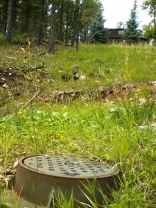 8001 Bighorn Rd Koupal, Pete and Patti This pit, with the cast iron lid is above (WEST) and to the left of our tanks. There is a shut off in the pit and no other shut off is known.